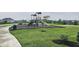 Community playground featuring a slide, swing set, climbing areas, and benches for neighborhood families at 16491 Wheatley Ct, Fishers, IN 46040