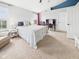 Bright bedroom features a ceiling fan, blue accent, and an area for a desk at 170 Straughn Ln, Westfield, IN 46074