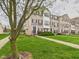 Brick townhomes feature sidewalks and professionally maintained landscaping at 170 Straughn Ln, Westfield, IN 46074