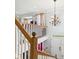 Bright foyer with chandelier and view of the front door at 170 Straughn Ln, Westfield, IN 46074