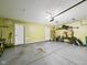 Spacious two car garage with side utility door and painted drywall at 170 Straughn Ln, Westfield, IN 46074