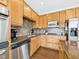 Functional kitchen with stainless steel appliances, dark countertops, and ample cabinet space at 170 Straughn Ln, Westfield, IN 46074