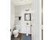 Stylish half bath with a pedestal sink, sleek fixtures, and a tastefully decorated mirror that adds elegance at 170 Straughn Ln, Westfield, IN 46074