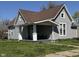 Charming home featuring a covered front porch, tidy landscaping, and a classic architectural design at 1922 N Cherry St, Columbus, IN 47201