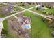 High angle image showcasing a neighborhood home with a private pool and lush backyard at 20251 Dayspring Ct, Noblesville, IN 46062