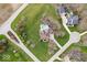 Aerial shot of home featuring a large, in-ground swimming pool and professionally landscaped yard at 20251 Dayspring Ct, Noblesville, IN 46062