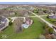 Wide aerial shot showing a swimming pool in the back yard of a neighborhood home at 20251 Dayspring Ct, Noblesville, IN 46062