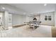 Spacious finished basement featuring a ping pong table and neutral colors at 20251 Dayspring Ct, Noblesville, IN 46062