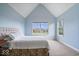 This bedroom features neutral walls, broad windows, and plush carpeting at 20251 Dayspring Ct, Noblesville, IN 46062