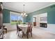 Stylish dining room offers a blend of traditional charm and views of the home's entry at 20251 Dayspring Ct, Noblesville, IN 46062