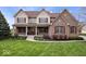 Charming two-story home with manicured lawn, covered porch, brick accents, and classic curb appeal at 20251 Dayspring Ct, Noblesville, IN 46062