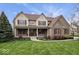 Charming two-story home with manicured lawn, covered porch, brick accents, and classic curb appeal at 20251 Dayspring Ct, Noblesville, IN 46062