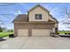Spacious three-car garage with brick facade and ample driveway parking at 20251 Dayspring Ct, Noblesville, IN 46062