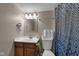 Bathroom showcasing modern vanity, and a decorative shower curtain at 2055 N Somerset Ave, Indianapolis, IN 46222