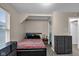 Bedroom featuring natural light, wood floors, and neutral walls, providing a comfortable living space at 2055 N Somerset Ave, Indianapolis, IN 46222