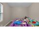 Inviting bedroom featuring wood flooring and natural light, offering a cozy and comfortable living space at 2055 N Somerset Ave, Indianapolis, IN 46222