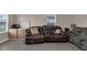 Cozy living room with comfortable seating and modern flooring, perfect for relaxing at 2055 N Somerset Ave, Indianapolis, IN 46222