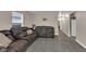 Inviting living room featuring wood floors and comfortable seating, perfect for relaxing and entertaining guests at 2055 N Somerset Ave, Indianapolis, IN 46222