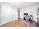 Spacious bedroom with a large closet, desk, and storage cabinet, perfect for a home office at 2416 Meadow Bend Dr, Columbus, IN 47201