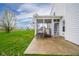 Back patio with easy access to the back yard and a covered porch area at 2416 Meadow Bend Dr, Columbus, IN 47201