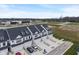 A view of a townhome community near shopping and dining that offers convenient access to local amenities and services at 3240 Arabian Ln, Zionsville, IN 46077
