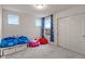 Bedroom featuring three windows and toy-themed beanbag chairs at 3240 Arabian Ln, Zionsville, IN 46077