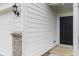 Front door view of a new construction home with brick accents and black hardware at 3240 Arabian Ln, Zionsville, IN 46077
