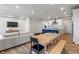 Open concept area connects the living room to the kitchen with dining and relaxation in mind at 3240 Arabian Ln, Zionsville, IN 46077