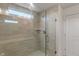 Glass shower with bench seat in bright main bathroom with modern tile at 3240 Arabian Ln, Zionsville, IN 46077