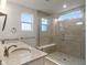 Bright main bathroom with double vanity, large glass shower, and light tile at 3240 Arabian Ln, Zionsville, IN 46077