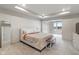 Spacious main bedroom features tray ceiling, neutral color palette, carpet, and a large window at 3240 Arabian Ln, Zionsville, IN 46077