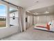 View of the spacious main bedroom with large windows and a door to an ensuite bathroom at 3240 Arabian Ln, Zionsville, IN 46077