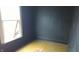 Bedroom featuring bright window and black accent wall at 3319 N Capitol Ave, Indianapolis, IN 46208
