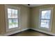 Bedroom showcasing bright windows and wood flooring, perfect for relaxation at 3319 N Capitol Ave, Indianapolis, IN 46208