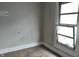 Bedroom featuring carpeted floor and a partially open window providing fresh air at 3319 N Capitol Ave, Indianapolis, IN 46208