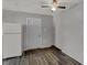 Kitchen and dining area includes appliances, laminate flooring, ceiling fan and a door for entry at 3343 N Drexel Ave, Indianapolis, IN 46218