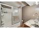 Bathroom featuring a shower with sliding glass doors and a marbled sink at 3360 E Main St, Danville, IN 46122
