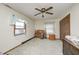 A bedroom featuring wood floors, a window, and a closet at 3360 E Main St, Danville, IN 46122