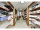 Hallway featuring closet storage and a doorway leading to other rooms in the house at 3360 E Main St, Danville, IN 46122