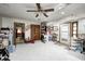 Spacious living room with a ceiling fan, a door, and a closet at 3360 E Main St, Danville, IN 46122