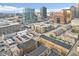 Scenic aerial view showcases the neighborhood and cityscape, highlighting the residential and commercial areas at 355 E Ohio St # 309, Indianapolis, IN 46204