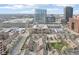 Panoramic aerial view displays the cityscape and surrounding residential areas, emphasizing the urban setting at 355 E Ohio St # 309, Indianapolis, IN 46204