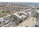 Apartment building with large parking area and surrounding buildings at 355 E Ohio St # 309, Indianapolis, IN 46204