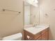 Bathroom featuring a single vanity and mirror at 355 E Ohio St # 309, Indianapolis, IN 46204