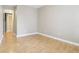 Neutral bedroom with hardwood floors; ensuite bathroom at 355 E Ohio St # 309, Indianapolis, IN 46204