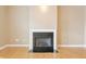 Cozy living room area with a fireplace and walls painted in neutral tones at 355 E Ohio St # 309, Indianapolis, IN 46204