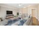 Cozy living room with comfortable seating, bright colors, a modern decor and a seamless flow to the second story at 355 E Ohio St # 309, Indianapolis, IN 46204