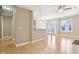 Spacious living area with hardwood floors, modern lighting, and access to a balcony at 355 E Ohio St # 309, Indianapolis, IN 46204