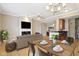 Inviting living space showcases an open layout connecting the dining area, kitchen, and cozy living room at 355 E Ohio St # 309, Indianapolis, IN 46204