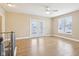 Upstairs loft features hardwood floors, natural light, and ceiling fan at 355 E Ohio St # 309, Indianapolis, IN 46204